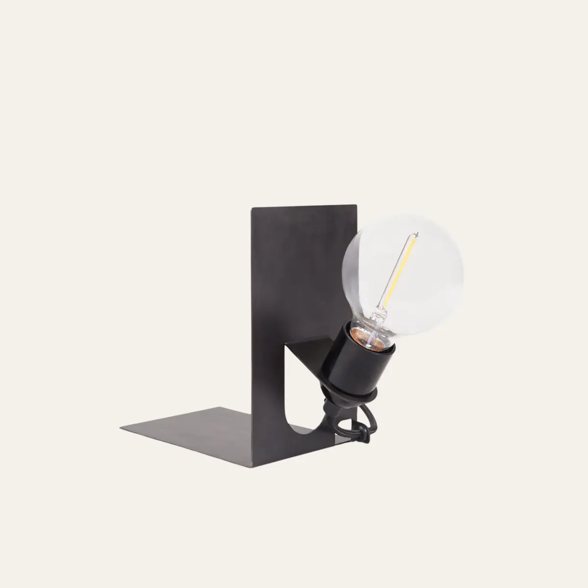 A minimal wall-mounted reading lamp.